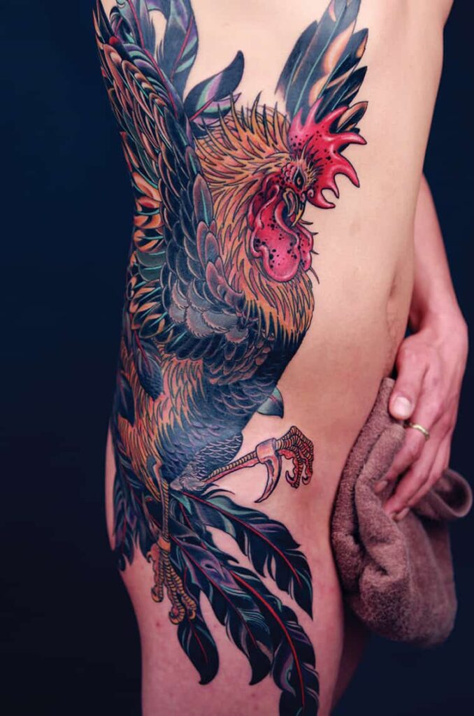rooster ribcage tattoo
